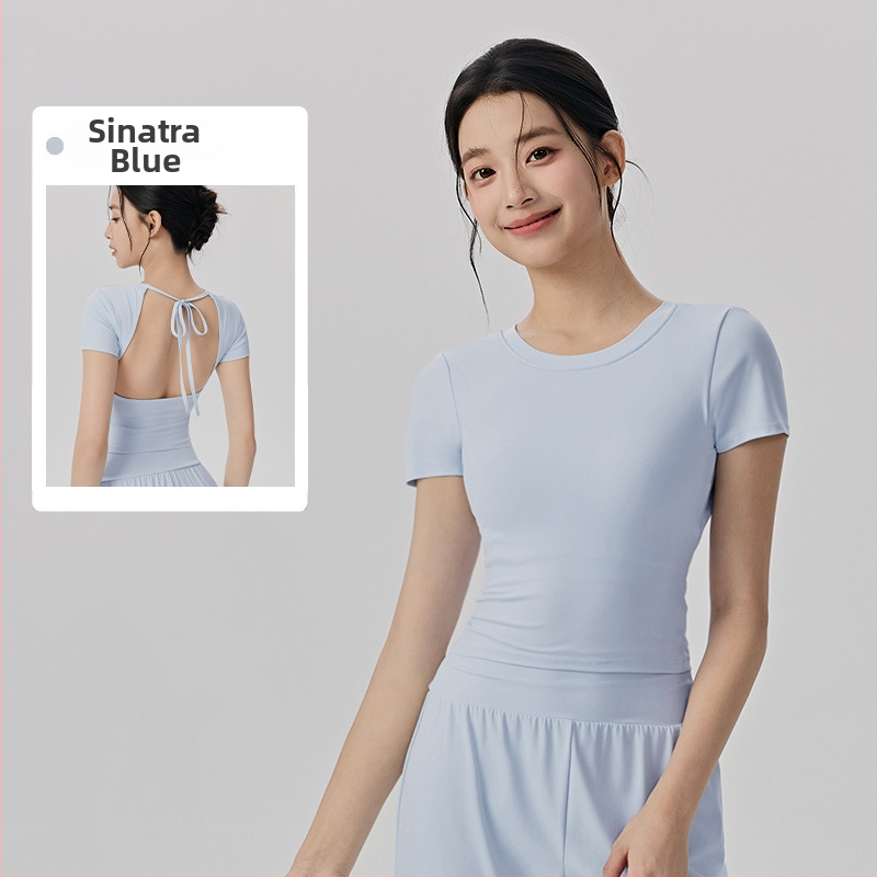 Sieviešu jogas tops ar iekšējiem krūšu spilventiem, īsām piedurknēm, cieši pieguļošs, divpusēji izbrūzēts audums, 78% neilons, 22% spandekss