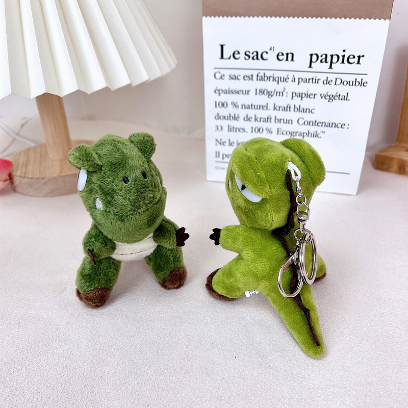 Plišani ključni lanac s dinosaurom, moderan minimalistički stil
