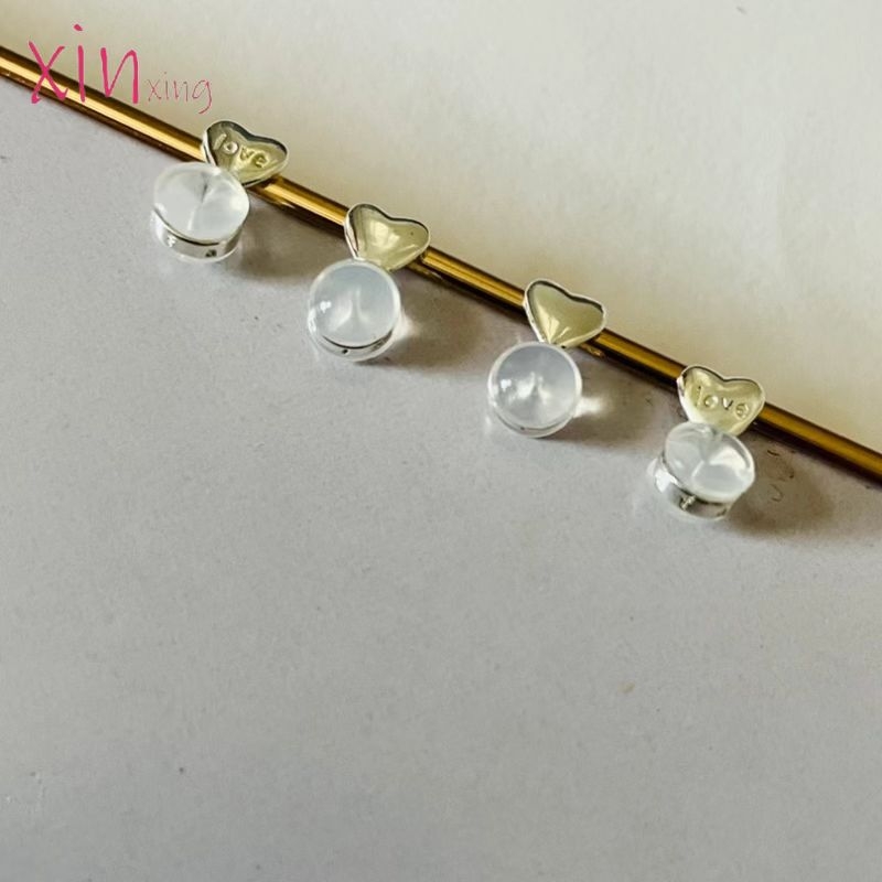 Füldugó: szív alakú és hengeres formájú, réz és szilikon, elektroplatírozás