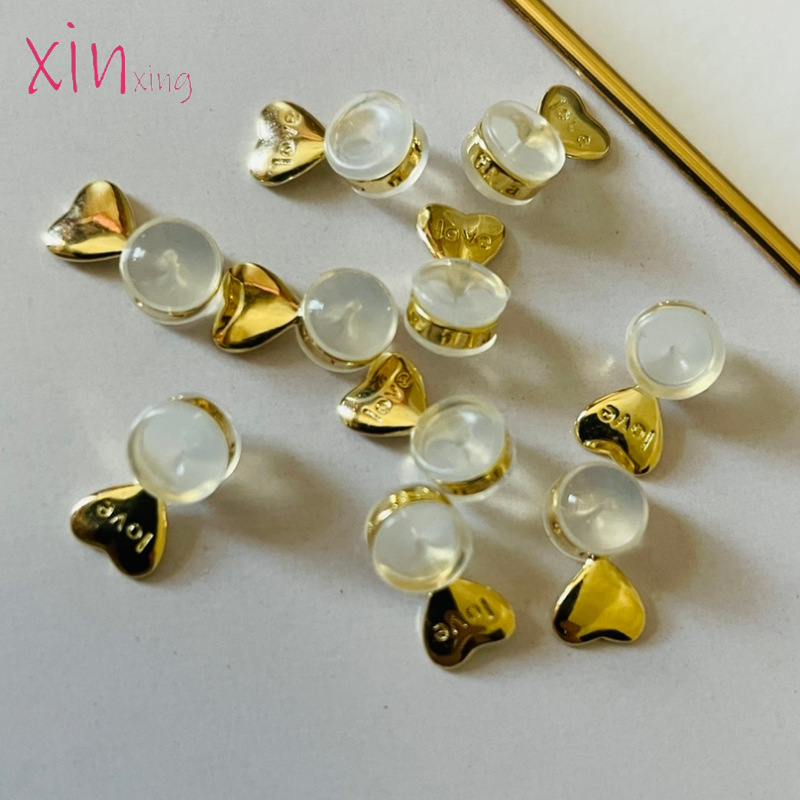 Szív alakú és hengeres fülkiegészítő rézből és szilikonból, elektrolitikus bevonattal