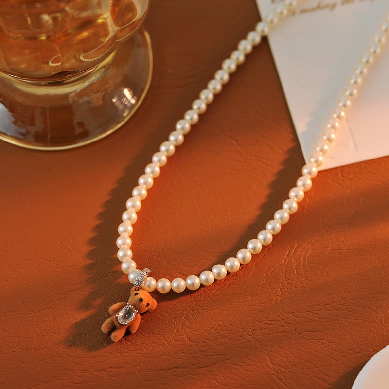 Karupoja kujuline kaelakee pärlketiga vasest sulamiga, kerge luksus stiil