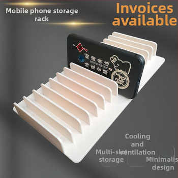 Augšējai uzņemšanai paredzēts statīvs vairākiem tālruņiem un planšetēm ar daudzslota uzglabāšanu un centrālo uzlādi uz galda - ABS plastmasa