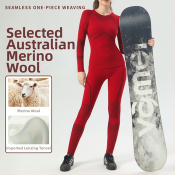 Sievietēm bezšuvju slēpošanas apģērbs ar Lyocell 70% un kokvilnas maisījumu, vilnas pamatdaļa 30%, garas piedurknes, garums līdz gurniem, ziemas/rudens sporta apģērbs