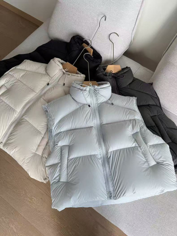 Ženska down vesta, slobodan kroj, stojeći ovratnik i zatvarač, perje bijele patke 86-90%, vanjski materijal od poliestera, zima 2025, casual korejsko-japanski stil