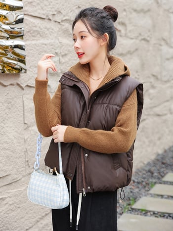 Ženska vesta s stojećim ovratnikom i zatvaračem, poliester tkanina, punilo poliester-bavlna, standardna duljina