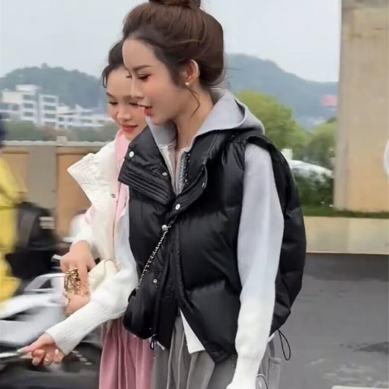 Ženski down prsluk, chenille tkanina, punilo bijeli kačji down (81–85%), glavni materijal Spandex, stojeći ovratnik