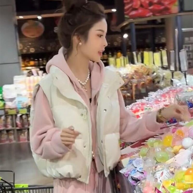 Ženski down prsluk, chenille tkanina, punilo bijeli kačji down (81–85%), glavni materijal Spandex, stojeći ovratnik