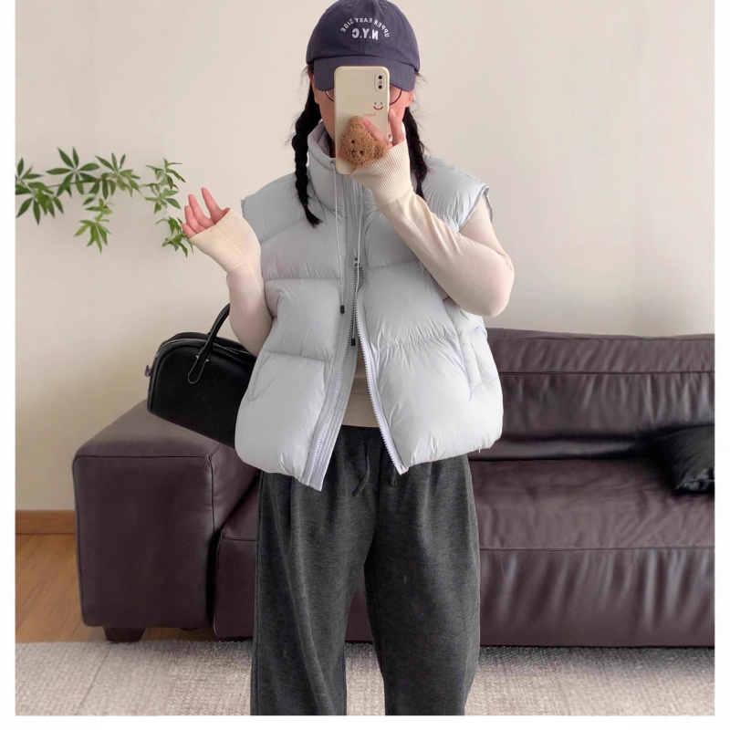 Ženska vesta s vanjskim najlonskim slojem, debela izolacija, punilo od patke perja 86-90%, prednji zip, stojeći ovratnik, casual japansko-korejski stil
