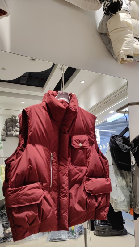 Ženski vesta s perjem, stojeći ovratnik i zatvarač – srednja debljina, normalna duljina (50–65 cm), nije uklonjiva, vanjska tkanina najlon, punilo: pačja perja, ležerni stil