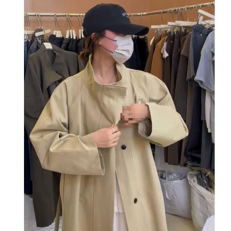 Ženski windbreaker srednje duljine s stojećim ovratnikom i reverom, za proleće i jesen, korejski stil, opušten kroj, kaiš za struk, britanski stil