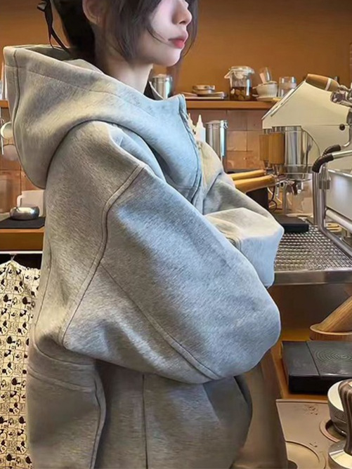 Hooded sweatshirt s dekonstruiranim dizajnom koláže, široki kroj, srednja duljina, zatvarač