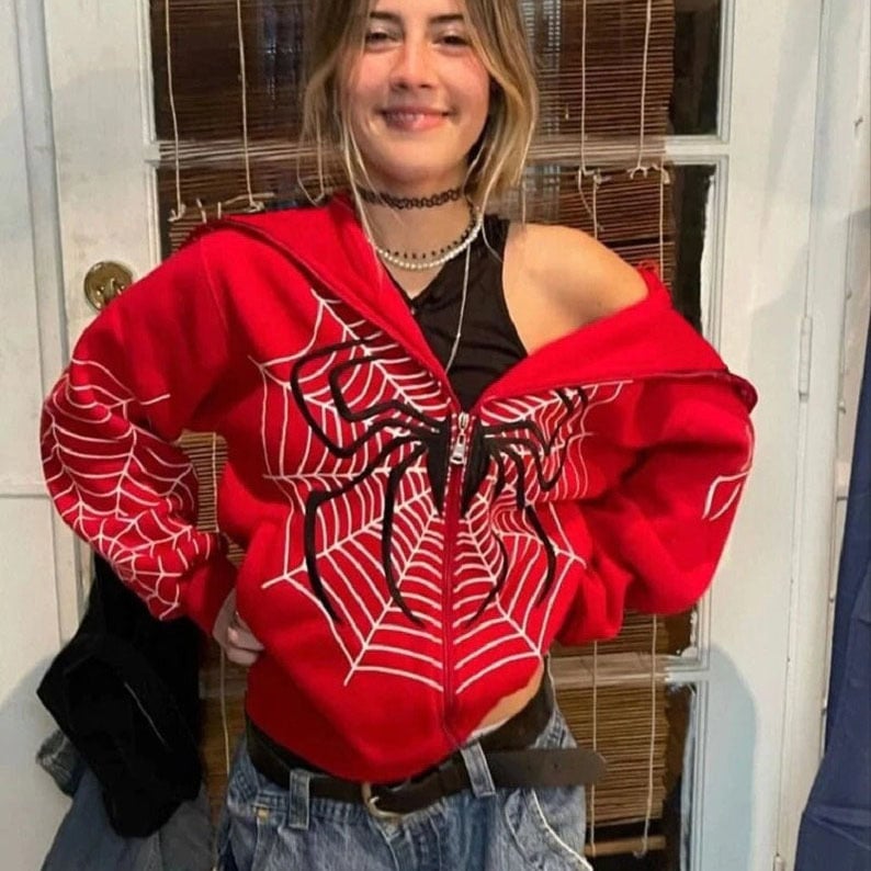 Női kapucnis pulóver cipzárral, pókhálós mintával, fleece bélés, poliészter anyag, laza szabás