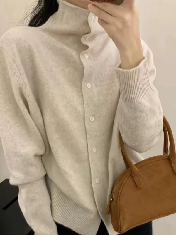 Korejiešu stilā kardigāns ar augstu kaklu, garām piedurknēm, vilnas adījums 95% vilna