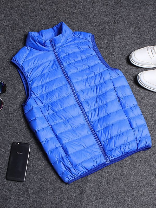 Vyrams skirta lengva medvilnės užpildyta be rankovių liemenė su nailonu išorėje, poliesterio pamušalas, laisvas kirpimas