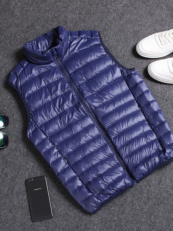 Vyrams skirta lengva medvilnės užpildyta be rankovių liemenė su nailonu išorėje, poliesterio pamušalas, laisvas kirpimas