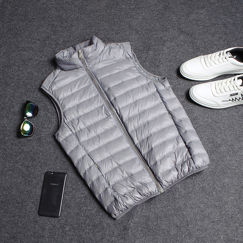 Vyrams skirta lengva medvilnės užpildyta be rankovių liemenė su nailonu išorėje, poliesterio pamušalas, laisvas kirpimas