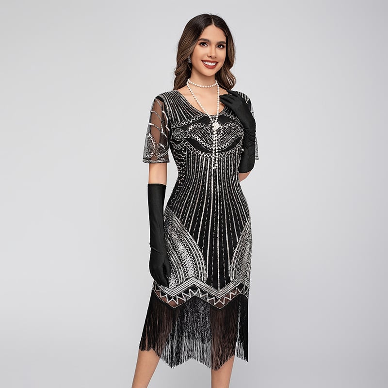 Pitskleit fringed detailiga, 1920s Gatsby õhtu stiilis, sädelevad helmeste aktsendid, lühikesed varrukad, midi pikkus