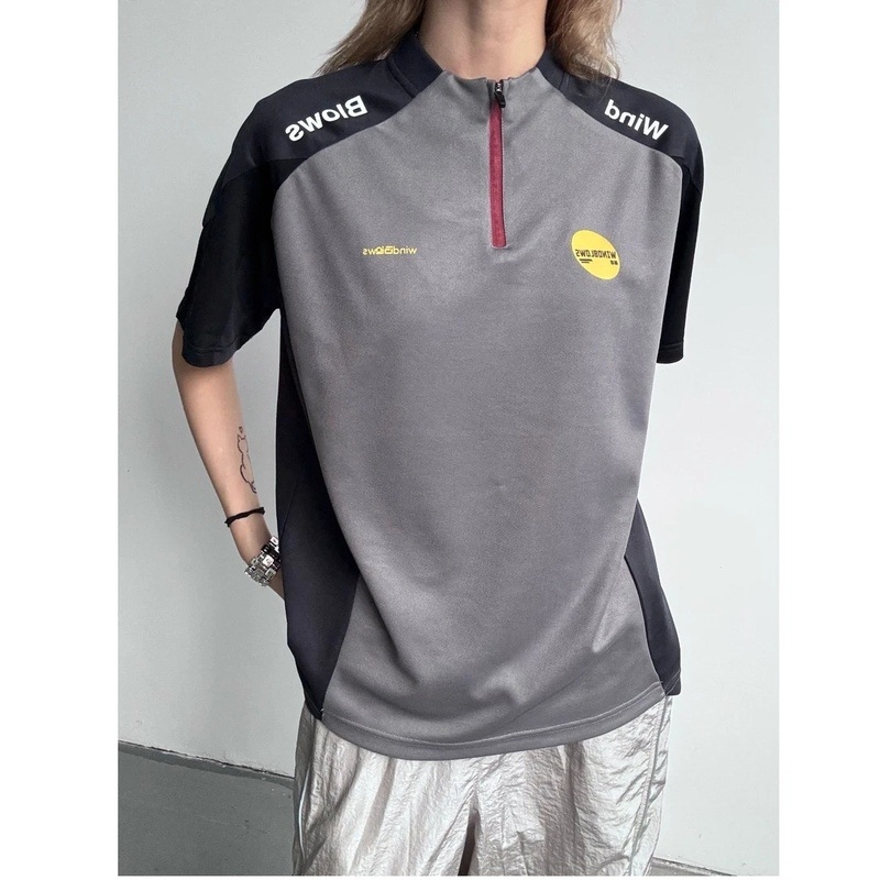 Unisex tričko s polovičným zipsom a kontrastným dizajnom, rýchloschnúce, UV ochrana, krátke rukávy, stojací golier, voľný strih, polyester 30–50%