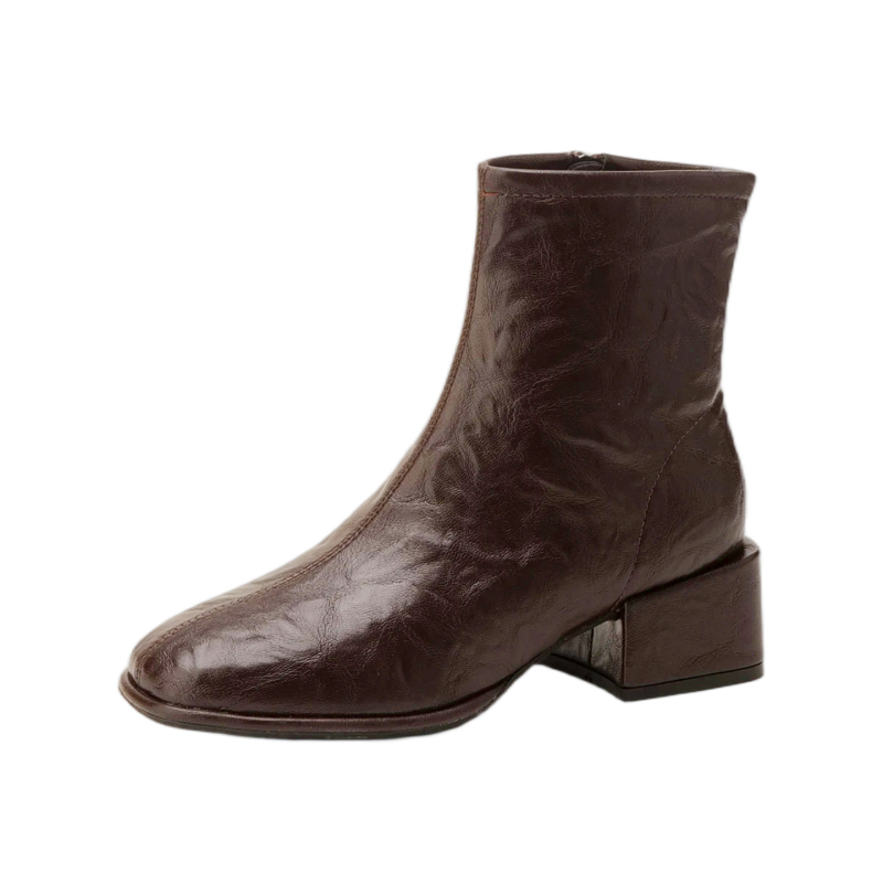 Moderne čizme: četvrtasti vrh, debeli potpetica, visina potpetice 3–5 cm, niski dio potkoljenice, francuski stil