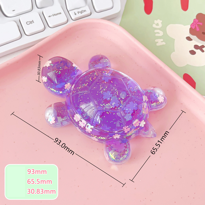 Särav tähistaevas liivast koomiksi suur kilpkonnakujuke otseülekande pimedate kottide sobitamine kontorilaua kaunistuste hulgimüük