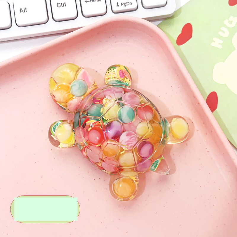 Särav tähistaevas liivast koomiksi suur kilpkonnakujuke otseülekande pimedate kottide sobitamine kontorilaua kaunistuste hulgimüük