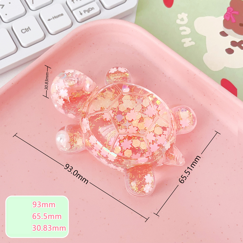 Särav tähistaevas liivast koomiksi suur kilpkonnakujuke otseülekande pimedate kottide sobitamine kontorilaua kaunistuste hulgimüük