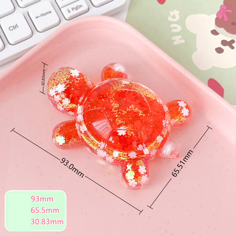 Särav tähistaevas liivast koomiksi suur kilpkonnakujuke otseülekande pimedate kottide sobitamine kontorilaua kaunistuste hulgimüük