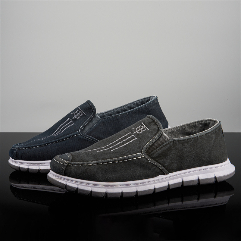 Vīriešu kanvas slip-on kurpes, apaļa purns, zems augšējais, plakana papēža, injekcijas zole, tekstila iekšdaļa