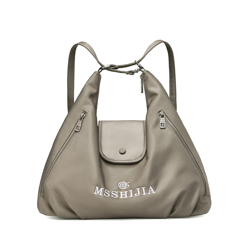 Vállon átívelő oldaltáska - Nylon; Cipzár; Horizontális négyzet alakú forma; Zsebes belső: cipzáras zseb és telefonzseb