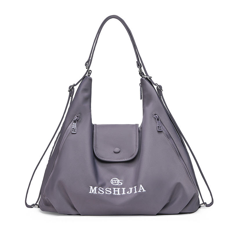 Vállon átívelő oldaltáska - Nylon; Cipzár; Horizontális négyzet alakú forma; Zsebes belső: cipzáras zseb és telefonzseb