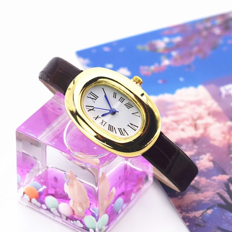 Női óra ovális számlappal, imitált bőrszíjjal — kvarc mozgás, analóg kijelző, tok ötvözetből