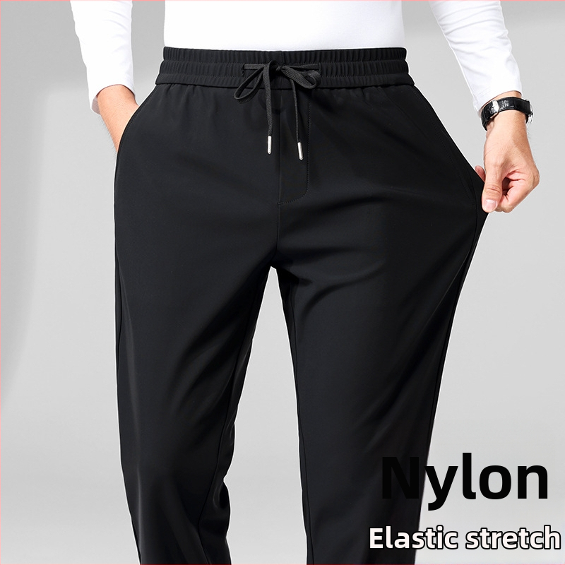 Meeste nailonist sportpüksid fliisvooderiga, sirge lõige, kõrge vöökoht, kõrge elastsus, vöökoha köis, 82,4% nailon / 17,6% spandeks