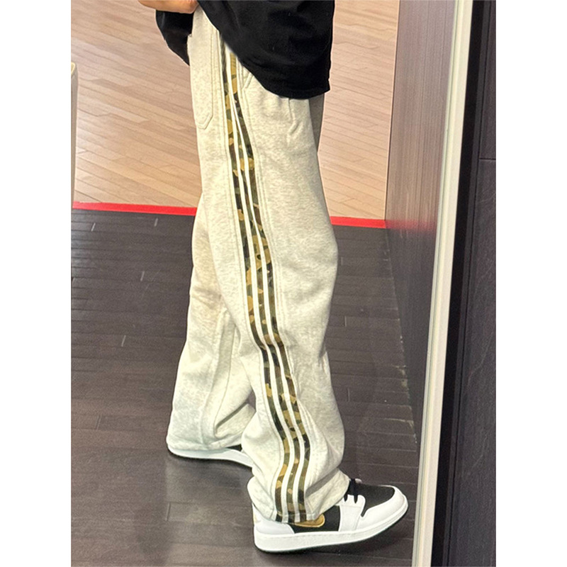 Sportske casual hlače - široka silueta, pruge, srednje visoki struk, 60% poliester s rastezom