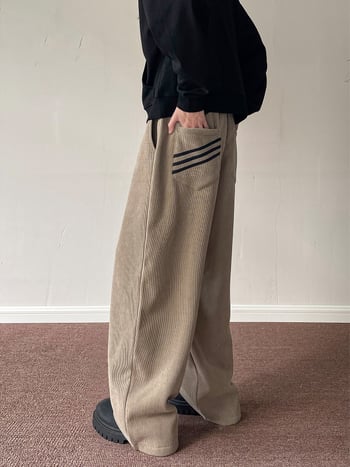 Muške hlače od korduroja s fleece podstavom, opuštenog kroja, širokih nogavica, srednji pojas, vezanje šnurnom