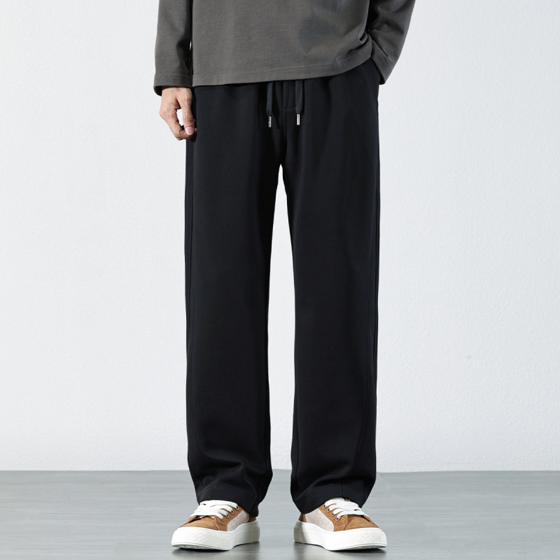 Muške trenirke s flis podstavom, elastična struka, ležeran kroj, ravne nogavice, 75% pamuk/25% poliester, jesen 2024