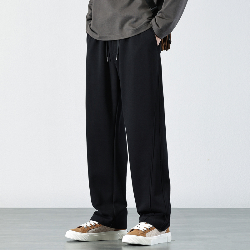 Muške trenirke s flis podstavom, elastična struka, ležeran kroj, ravne nogavice, 75% pamuk/25% poliester, jesen 2024