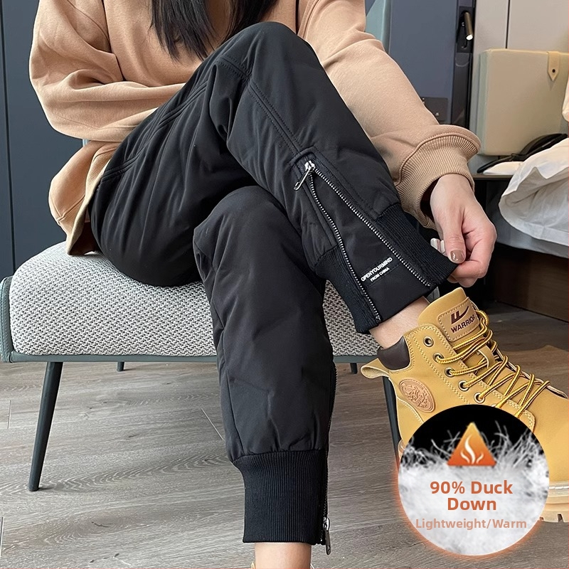 Naiste down püksid kõrge vöökoht, vaba lõikega harémistiil, nailonist väline kangas, valge pardiapu täidis, talvemudel 2025