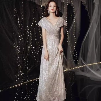 Rochie de seară cu decolteu în V și paiete, siluetă prințesă cu bustle, talie înaltă, fustă lungă, mâneci 3/4