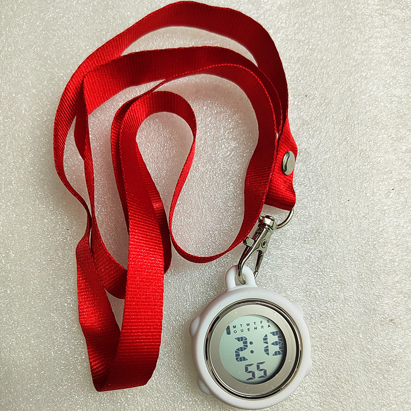 Aprūpes fob pulkstenis ar auklu, elektronisks digitālais pulkstenis, apļveida cinka sakausējuma korpuss, digitālais displejs, kalendārs ar 24 stundu rādījumu, nedēļa un mēnesis, gaismas ciparnīca