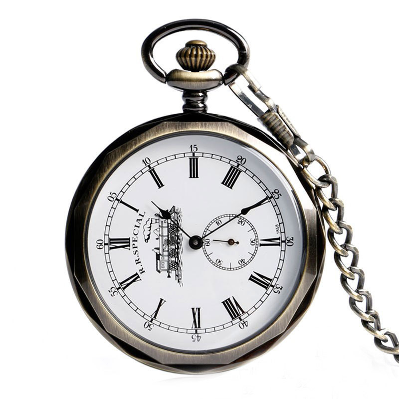 Antikvarinis kišeninis laikrodis su atvira priekine puse, graviruotas traukinių motyvas, skaidrus galinis dangtelis, rankinis mechaninis judėjimas, lydinio korpusas