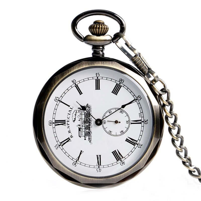 Antikvarinis kišeninis laikrodis su atvira priekine puse, graviruotas traukinių motyvas, skaidrus galinis dangtelis, rankinis mechaninis judėjimas, lydinio korpusas