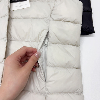 Vesta cu puf din nylon, conținut puf 86–90%, umplutură din puf de rață, grosime medie