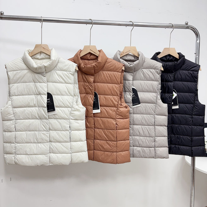 Vesta cu puf din nylon, conținut puf 86–90%, umplutură din puf de rață, grosime medie