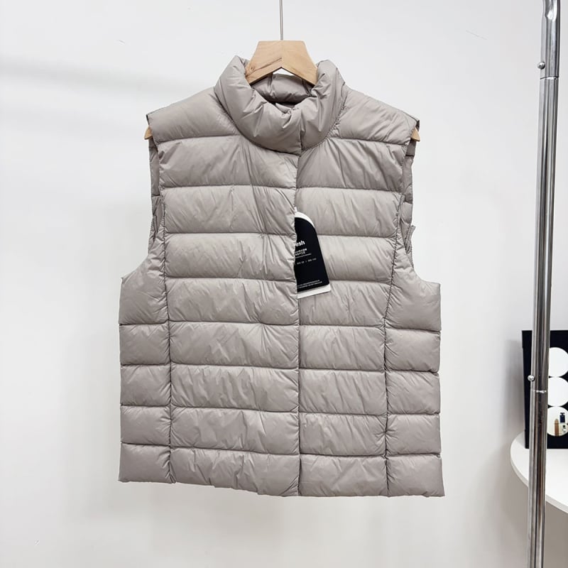 Vesta cu puf din nylon, conținut puf 86–90%, umplutură din puf de rață, grosime medie