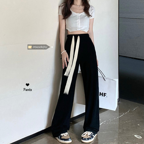 Pantaloni casual dama din poliester, croială largă (Material: poliester; Compoziție: 95%+; Croială: largă; Talie: liberă; Grosime: subțire)