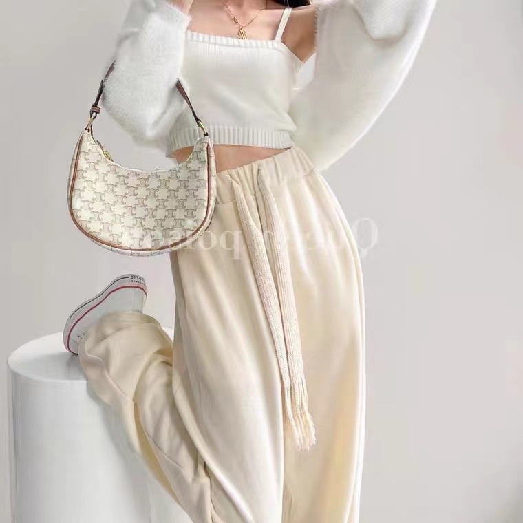 Pantaloni casual dama din poliester, croială largă (Material: poliester; Compoziție: 95%+; Croială: largă; Talie: liberă; Grosime: subțire)