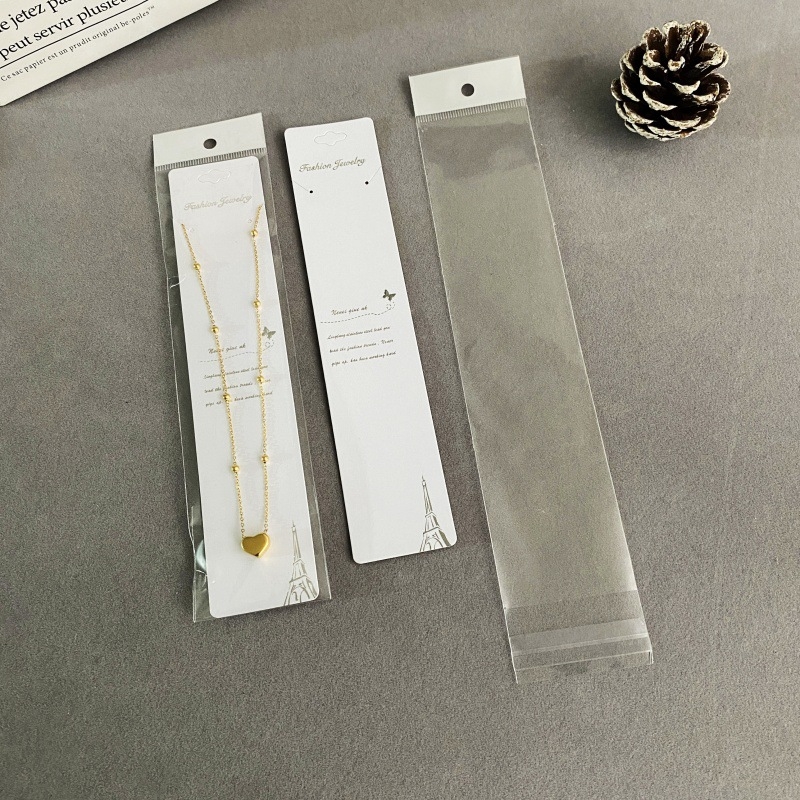 Piekaramais kulons ar konvekss formu, balts kartons, druka, vienkārša sērija, pavasara 2023 izlaidums