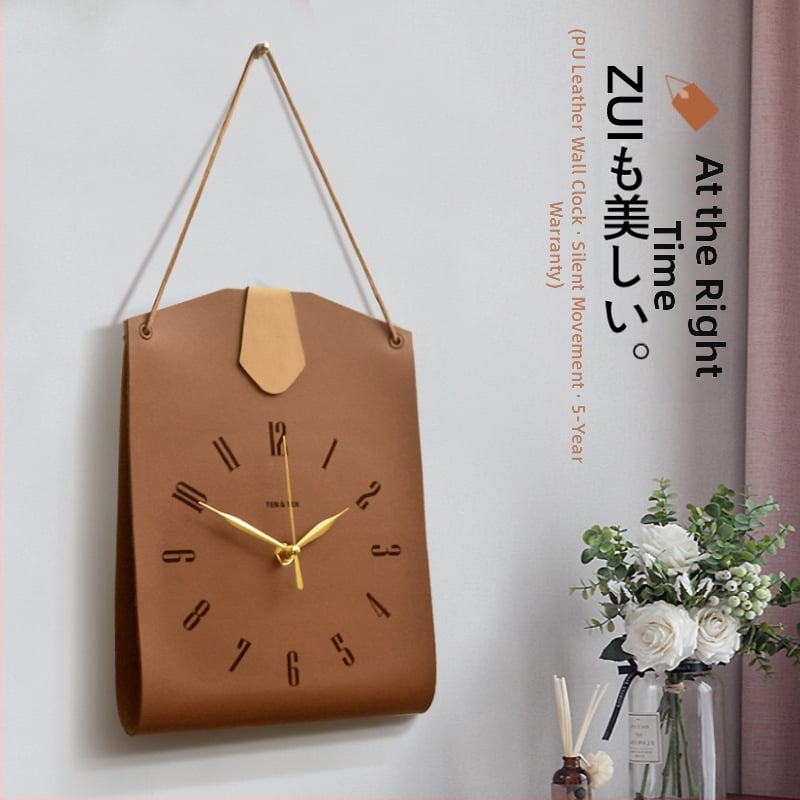 Bőr táskává formázott falióra — egyoldalas, sweep-mozgású, akkumulátoros működés, számozott számlap