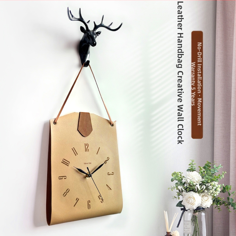 Bőr táskává formázott falióra — egyoldalas, sweep-mozgású, akkumulátoros működés, számozott számlap