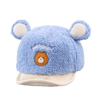 Zīdaiņu cepure no ait vilnas ar kupola formu un īsu malējumu; ausu aizsardzība; elpojoša, silta, pret vēju; 6–12 mēnešus un 1–2 gadus